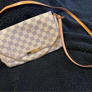 White and gray authentic Louis Vuitton favorite Crossbody should bag.